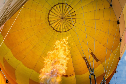 A picture of a hot air balloon rising the same way a business should strive to rise above its competition.